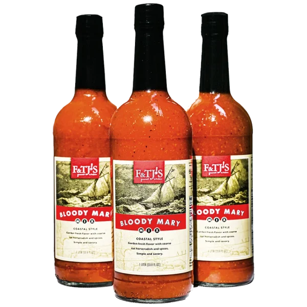 3-pack bundle of F&TJ'S Carolina Bloody Mary Mix 1-liter bottles on a transparent background.