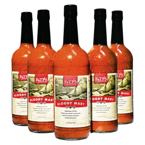 6-pack of F&TJ'S Carolina Bloody Mary Mix 1-liter bottles with a transparent background.