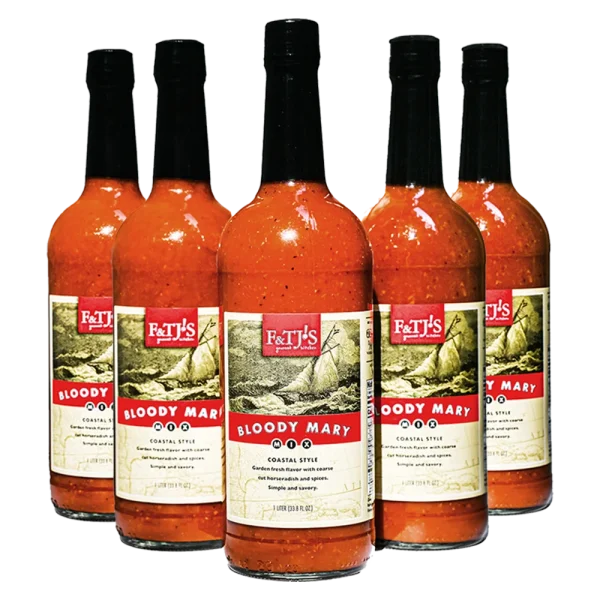 6-pack of F&TJ'S Carolina Bloody Mary Mix 1-liter bottles with a transparent background.